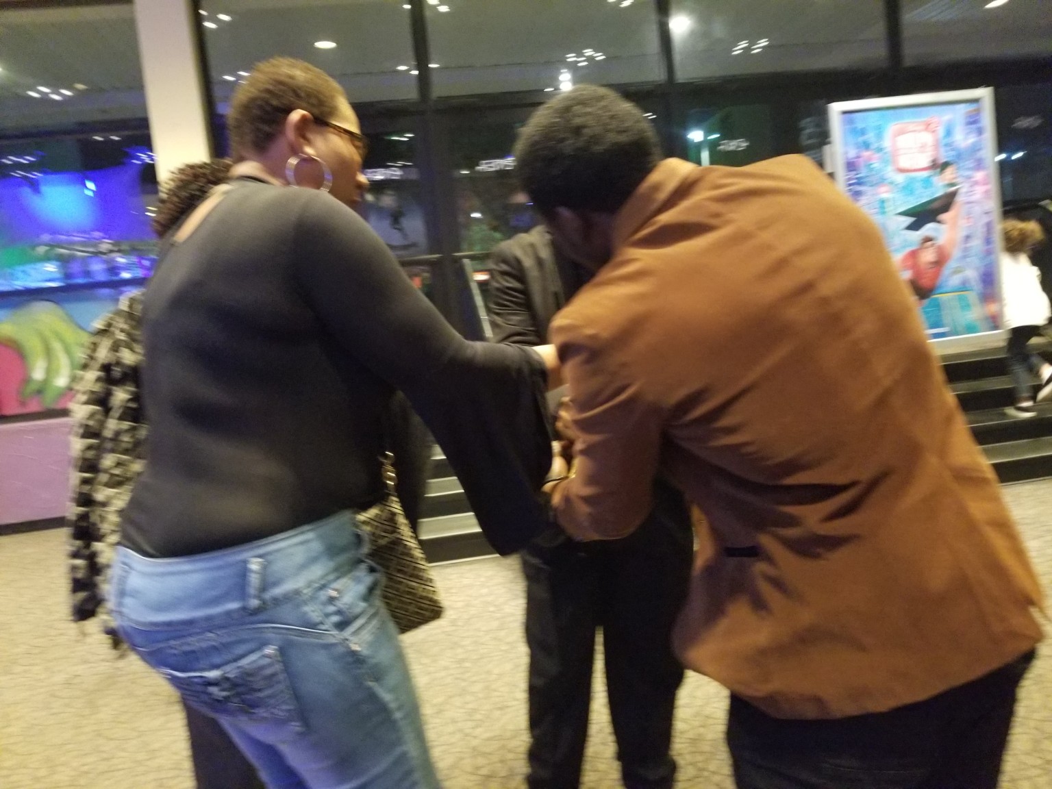 Guests greeting one another during the movie premiere