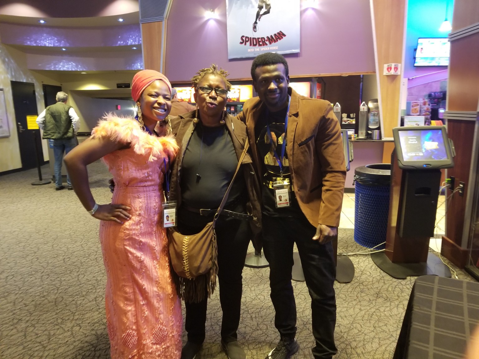 Premiere guests posing together inside the theater